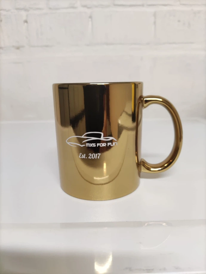 IOTY 2025 - gouden mok